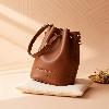 iseigur Minimalist Brown Bucket Bag, Calfskin Material with Gold Metal Hardware Niche High-End Shoulder Bag